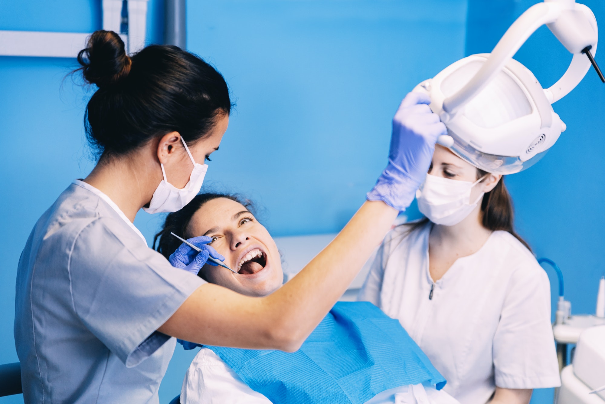 Dentist repairing a broken or chipped tooth