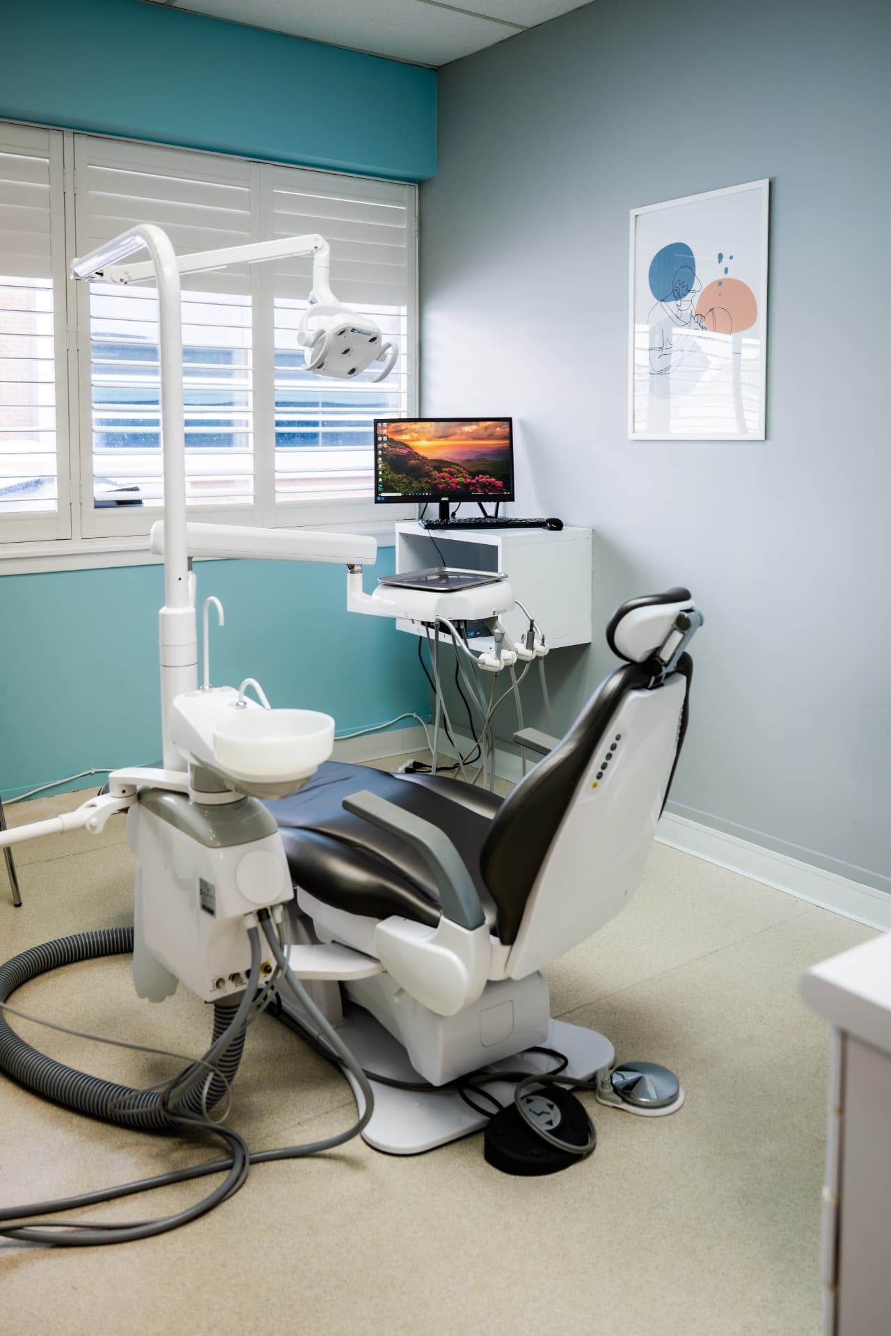 Bright dental operatory with modern chair and equipment