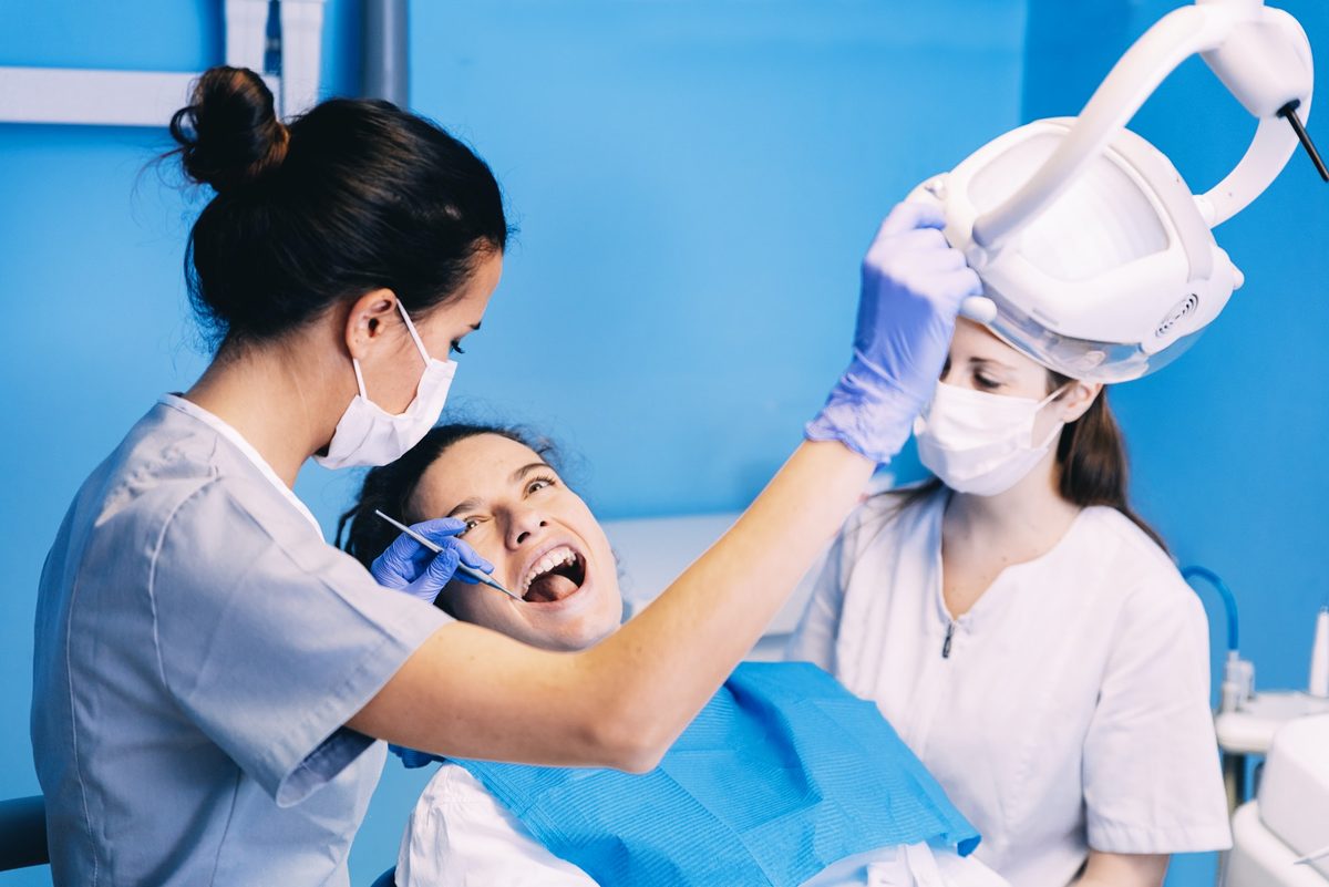 Dentist repairing a broken or chipped tooth