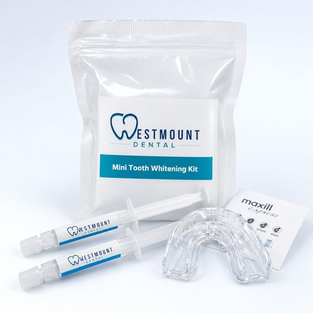 Complimentary Westmount Dental take-home teeth whitening kit with gel syringes and mouth tray