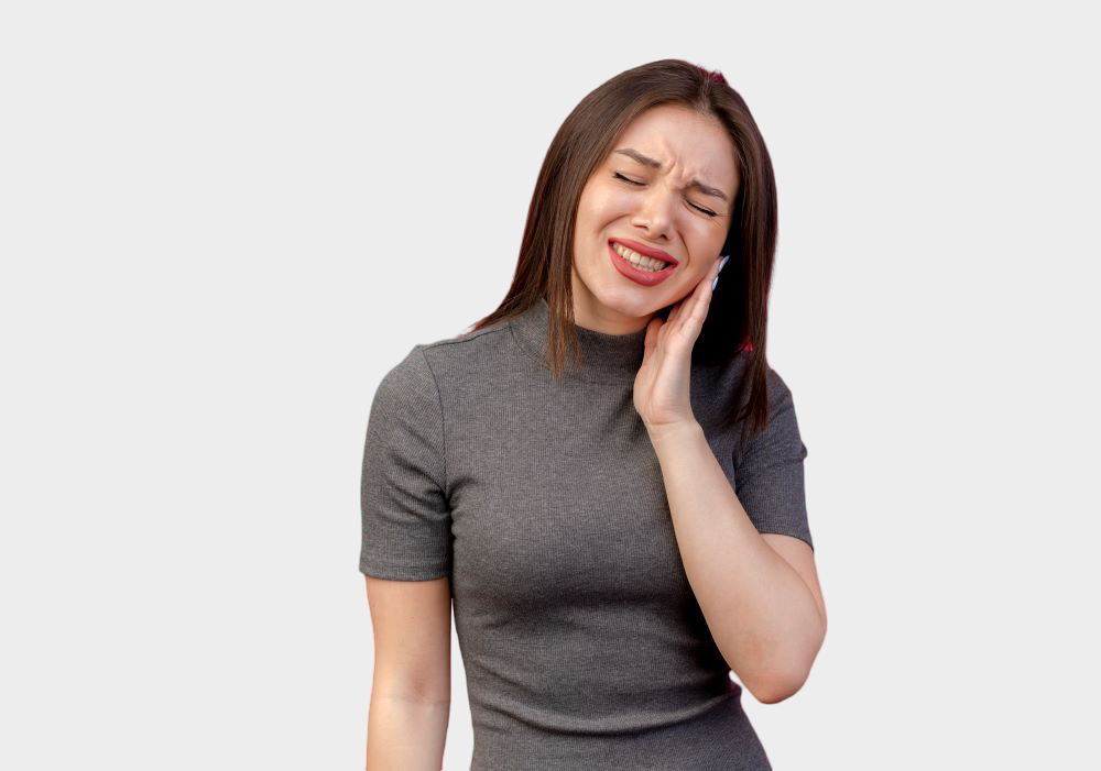 Woman holding her jaw due to severe tooth pain